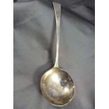 A George III silver John McFerlan ladle, London 1786, monogrammed, total weight approx. 37g