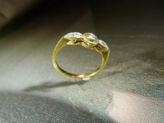 18ct Yellow Gold Art Deco Diamond set ring. Circular central stone 'floats' in a larger set circle