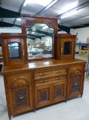 Mahogany mirror backed dresser - mirror flanked by two cupboards and below sits two drawers with