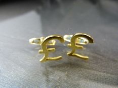 18ct Yellow Gold Cufflinks. The front in the form of a 'Pound Sign' and stamped 750 to back. Total