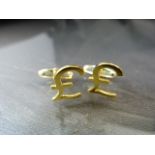 18ct Yellow Gold Cufflinks. The front in the form of a 'Pound Sign' and stamped 750 to back. Total