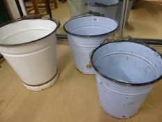 Three enamelled buckets