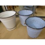 Three enamelled buckets