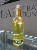 Demonstration/Display bottle for Moschino - Gilding worn around the top and liquid inside