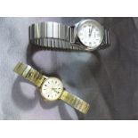 9ct Gold Tissot ladies wrist watch - strap is plated. Along with a Lorus ladies wrist watch