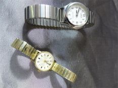 9ct Gold Tissot ladies wrist watch - strap is plated. Along with a Lorus ladies wrist watch