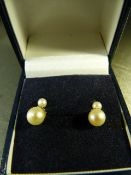 9ct Gold Cultured Pearl earrings hallmarked on the prong terminating with an approx 3.7mm stone with