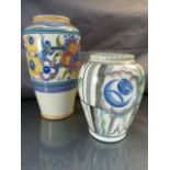 A 1930`s Poole Pottery Vase decorated in the YO pattern with coloured stylised flower heads and
