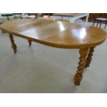 Large extending mahogany table on Barley Twist legs with castors - Handle in office