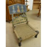 Indian chair with rope seat and handpainted decoration to back. The Seat is low and ebonised wood.