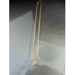 9ct Gold Pendant set with an approx .10ct Diamond set within a 4 claw setting. Hung from an 18" fine