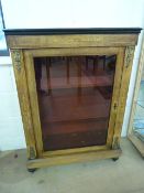 Edwardian inlaid cabinet with shelving in. Ebonised wooden surrounds and Spelter decoration to