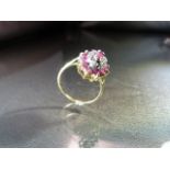 9ct Gold Diamond Ruby and Diamond dress ring. The Marquise shaped cluster measures approx 15.10mm