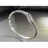 Good Quality Silver (925) Black and White CZ crossover style bangle approx 3.5mm wide and approx