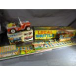 Unusual Indian Tinplate shuttle and track clockwork toy with key and original box. c.1930/40. Once