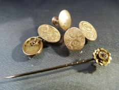 15ct Gold stick pin set with a small Ruby. A pair of 9ct Gold (Chester 1897), hand engraved double