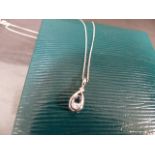 9ct White gold chain set with a 9ct white gold tear drop pendant. Total weight approx 2g in Ernest