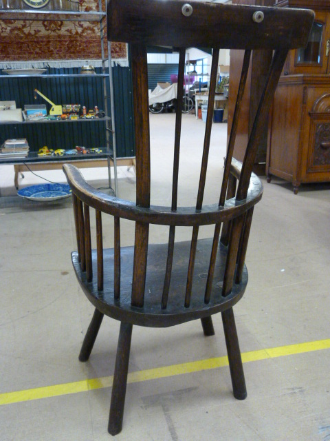 An Antique welsh comb back chair in Ash and poss Fruitwood with curved top rail. Thick odd shaped - Image 5 of 6