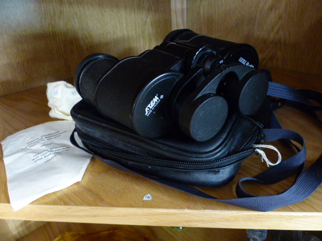 Pair of Russian Binoculars in fitted case with instruction manual and lense cleaner