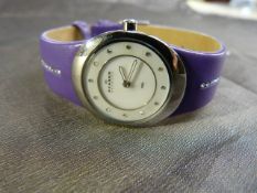 Ladies Skagen (Denmark) purple leather and steel Wristwatch set with CZ stones to band and face.