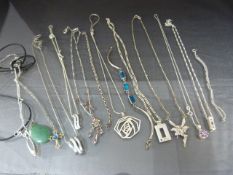 Collection of mostly silver necklaces with chains and pendants - Total weight 69.9g