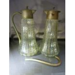 Pair of glass and pewter claret jugs, one AF