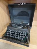 Imperial 'The Good Companion Model T' wartime typewriter in original black fitted case - in good