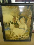 Needlepoint of a lady in black ebonised frame