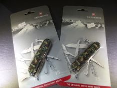 Two Victorinox 15 function original Swiss Army Knives in Camo colour. Unopened in casing.
