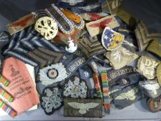 Collection of various military badges etc