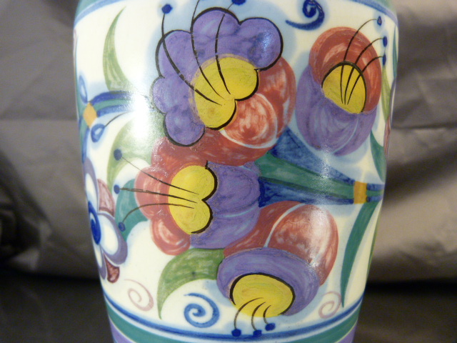 A 1930`s Poole Pottery Vase decorated in the YO pattern with coloured stylised flower heads and - Image 4 of 10