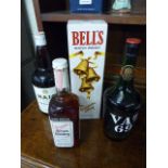 Four bottles of modern Whiskys 'Jim Beam', Bells scotch whisky etc