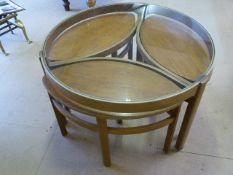 Mid-Century glass topped round table with three smaller tables to pull out - making a nest of four