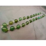 Early Green glass beaded necklace and Rock crystal necklace on possible silver chain