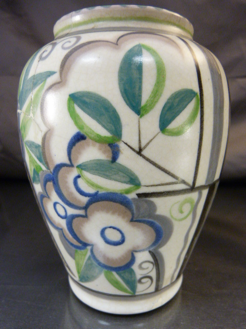 A 1930`s Poole Pottery Vase decorated in the YO pattern with coloured stylised flower heads and - Image 9 of 10