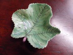 A very rare Bow leaf shaped dish hand painted in vibrant green with purple stalk c.1740 - 50