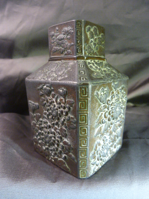 Oriental Bronzed Tea Caddy with Lid and Cover. Decorated with embossed floral motif's