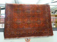 Large Red ground rug with navy all over design