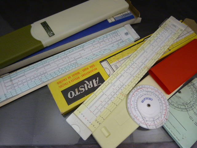 Three vintage slide rules