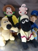 Four Wallace and Gromit dolls along with Postman Pat