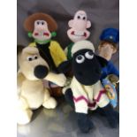 Four Wallace and Gromit dolls along with Postman Pat