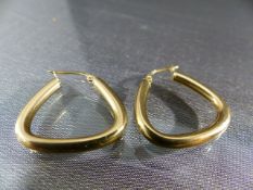 Pair of 9ct Hollow yellow Gold earrings - marked 9ct. Rounded triangular shape. Weight approx 1.8g