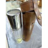 Leather cased Hunting Flask - leather case containing glass flask with detachable silverplated cup.