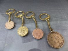 Coins - Four various coins mounted on key-rings - 1937 George VI Three-pence, 1900 Victoria Penny,