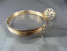 A 9ct childs bracelet and 9ct gents ring (no stone) total weight 8.3g