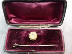Original boxed 15ct Gold Diamond set stick pin/ Dress stud. The Approx 10pt old mine cut diamond