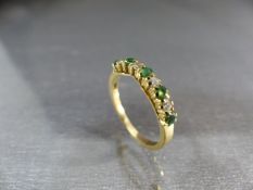 9ct Gold Half Hoop Emerald and Diamond Eternity Ring. Five approx 2.5mm diameter Emeralds and four