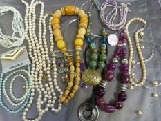 Collection of chunky necklaces and collection of faux pearl necklaces and two modern brooches