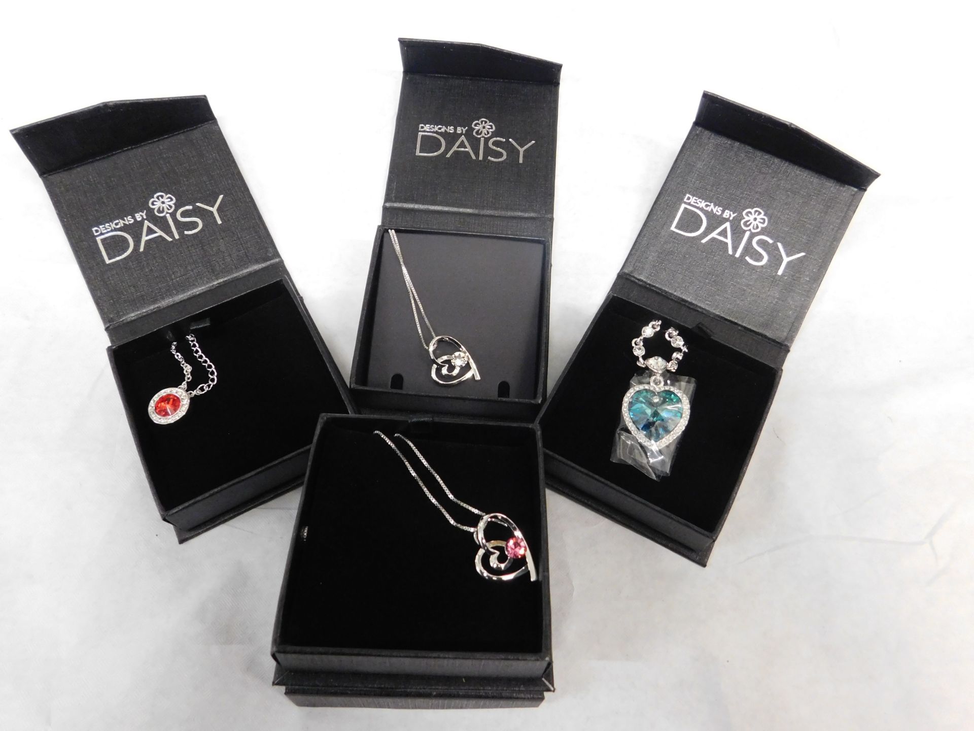 1 BOX OF APPROX 26 DESIGN BY DAISY NECKLACES RRP £300