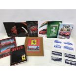 A collection of Ferrari related literature to include two blue and white Maranello Concessionaires